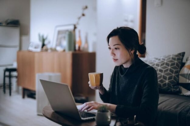 https___specials-images.forbesimg.com_imageserve_60d0c9ff80bd18ef664702c0_Busy-concentrated-young-Asian-woman-working-from-home-working-on-laptop-till-late-in_960x0-1-768×511